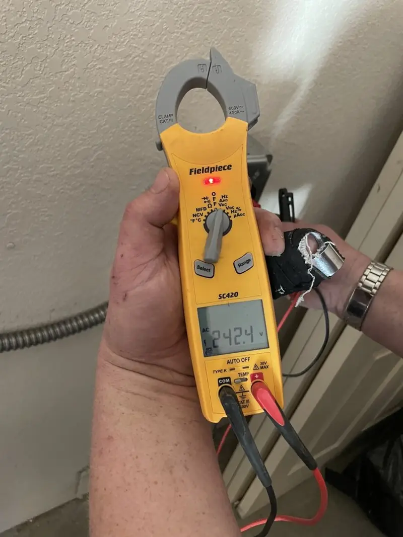 Voltage testing with clamp meter during Electrical Installation Services in Port Hueneme